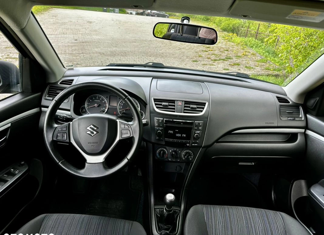Suzuki Swift cena 27900 przebieg: 95000, rok produkcji 2014 z Bełchatów małe 22
